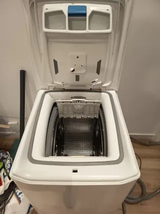 Lavadora Otsein 6kg 1200 rpm carga superior.