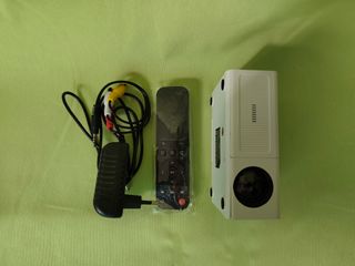 Mini proyector LED portátil F1 con mando - Blanco