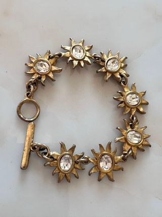 Braccialetto vintage sole cristalli dorato firmato