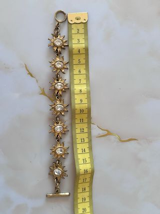 Braccialetto vintage sole cristalli dorato firmato