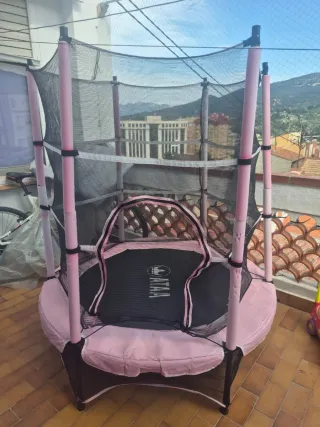Trampolín infantil rosa con red de seguridad