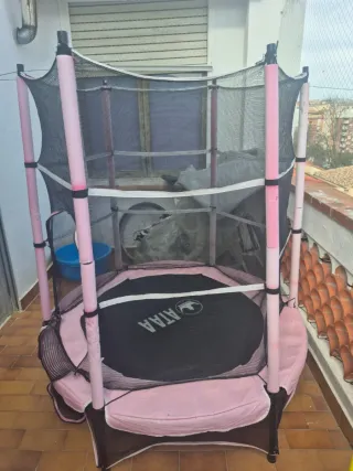 Trampolín infantil rosa con red de seguridad