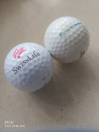 2 Bolas de Golf Swiss Life y Manulife financial