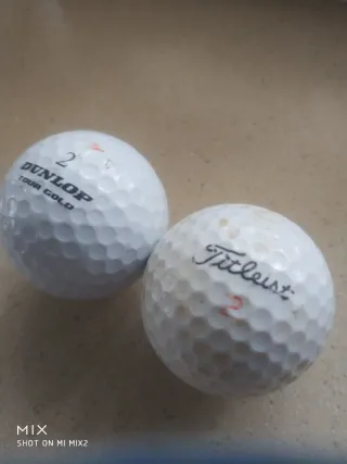 2 Bolas de Golf Swiss Life y Manulife financial