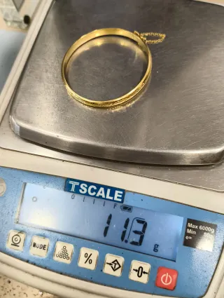 Pulsera Caña Oro 18kt tallada con cadena seguridad