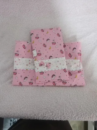 Conjunto cambiador y billetera rosa unicornios