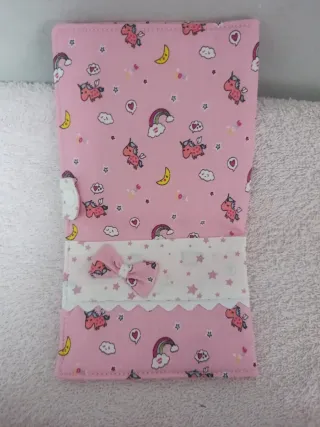 Conjunto cambiador y billetera rosa unicornios