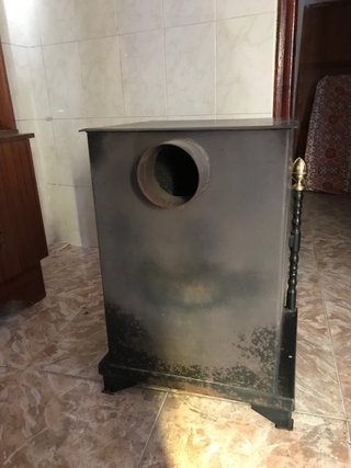Estufa rústica de leña y estufa de gas butano