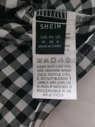 Blusa cuadros blanco y negro