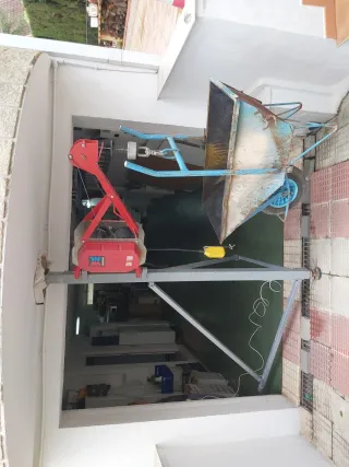Maquinillo elevador Wiskers construcción