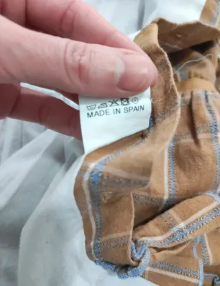 Jesusito niña cuadros marrón lazo azul