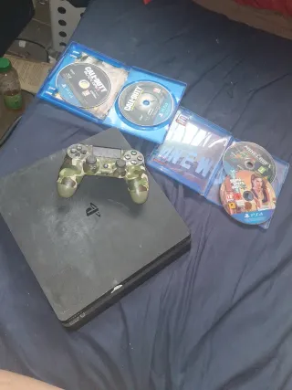 PS4 Slim 500 gb+ Mando Camuflaje + 4 Juegos