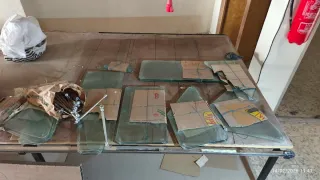 Estanterías cristal y acero cromado