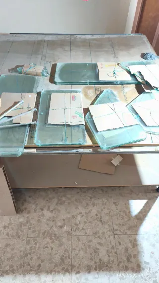 Estanterías cristal y acero cromado