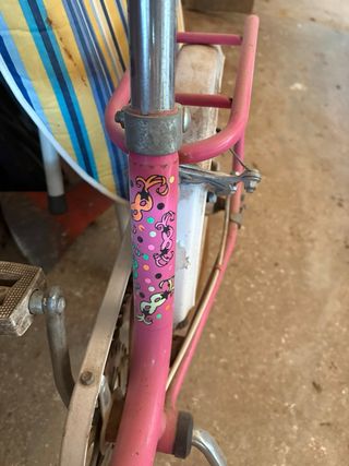 Bicicleta rosa plegable