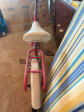 Bicicleta rosa plegable