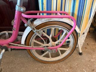 Bicicleta rosa plegable
