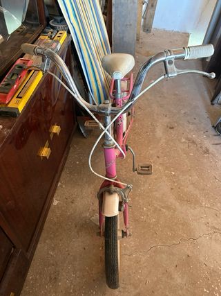 Bicicleta rosa plegable