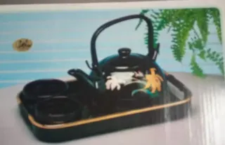Juego de té/café negro con detalles dorados
