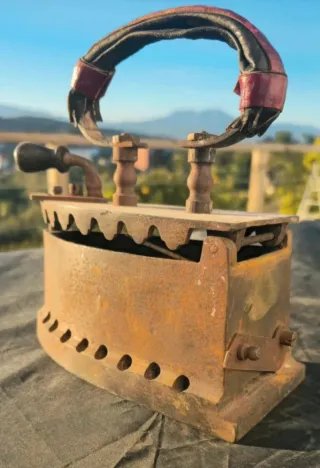 Antigua plancha de carbon