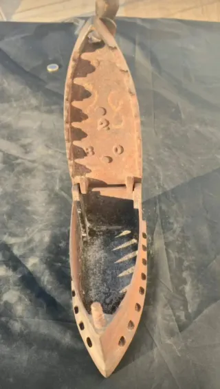 Antigua plancha de carbon