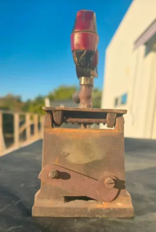 Antigua plancha de carbon