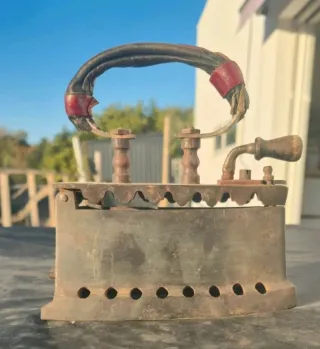 Antigua plancha de carbon