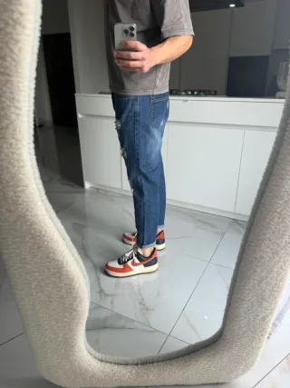 Jeans denim strappati taglia 50