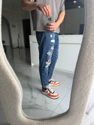 Jeans denim strappati taglia 50