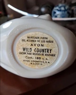 Figura Avon Porcelana y Metal