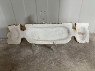 Scultura in gesso dorato