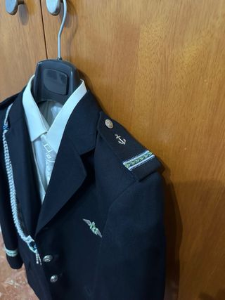 Traje de comunión azul marino del corte inglés.