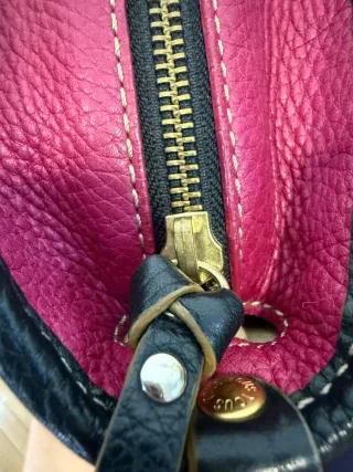 Bolso piel Tous fucsia y negro