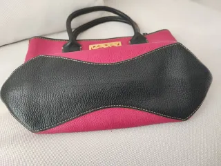 Bolso piel Tous fucsia y negro