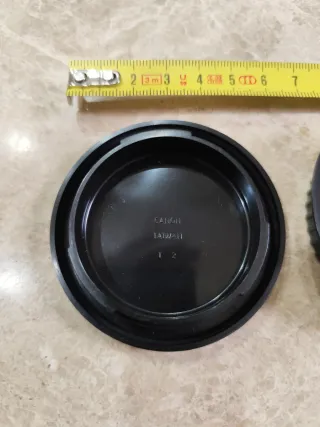 Tapas de objetivo Canon