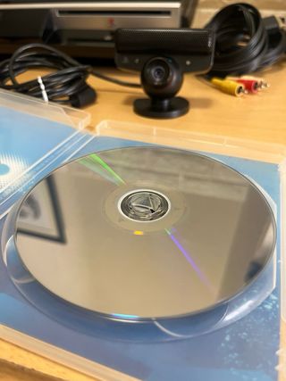 Playstation 3 + Mando + Cámara + Juego