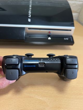 Playstation 3 + Mando + Cámara + Juego