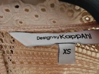 Blusa romántica beige