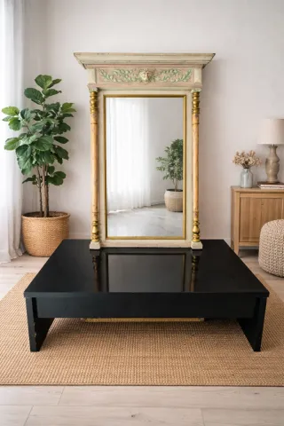 Espejo y mesa de centro negros y dorados
