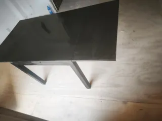 Mesa extensible negra.