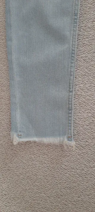 Pantalón pitillo con flecos de mujer