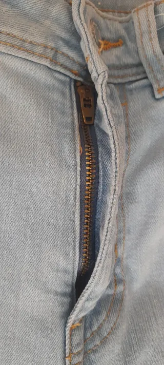 Pantalón pitillo con flecos de mujer