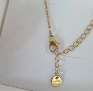 Collana con ciondolo a cuore dorato