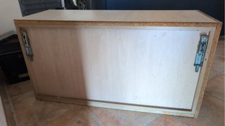 Armario puerta abatible madera y cristal