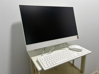 .-HP Todo en Uno Blanco.-