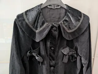 Blazer negro con lazos