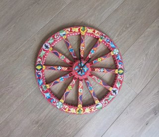 Orologio da parete in legno decorato