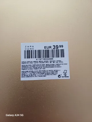 Espejo de pared dorado