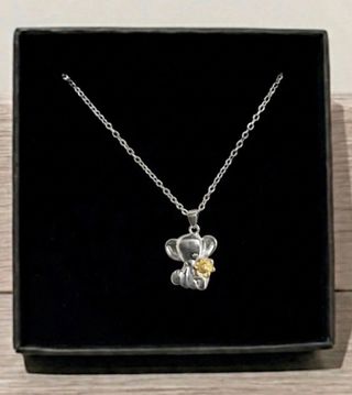 Collana con ciondolo elefante e fiore
