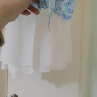 Original blusa sin mangas con lazo trasero